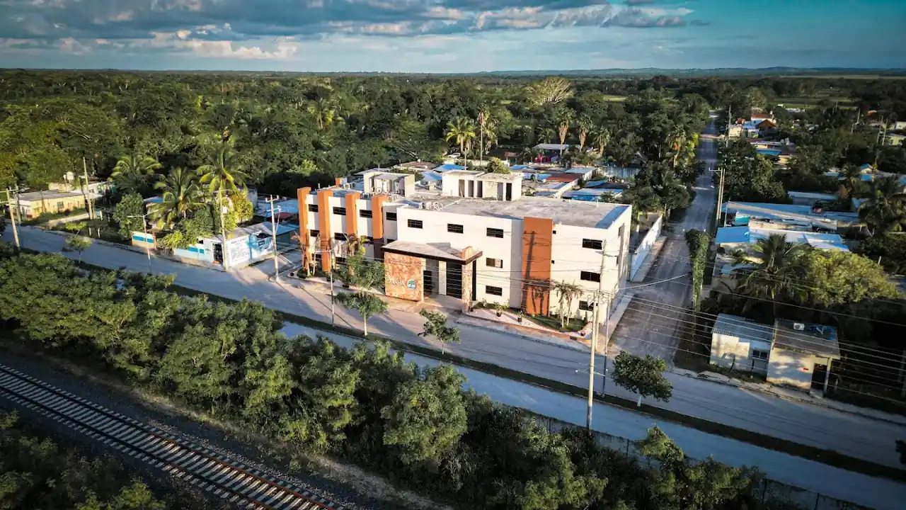 Aerial view of Hotel Taxaha and its green surroundings in Candelaria